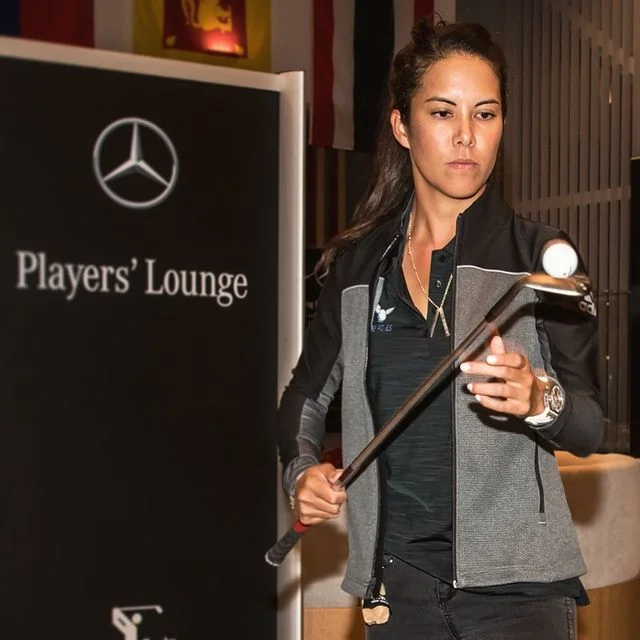 Tania handling golf